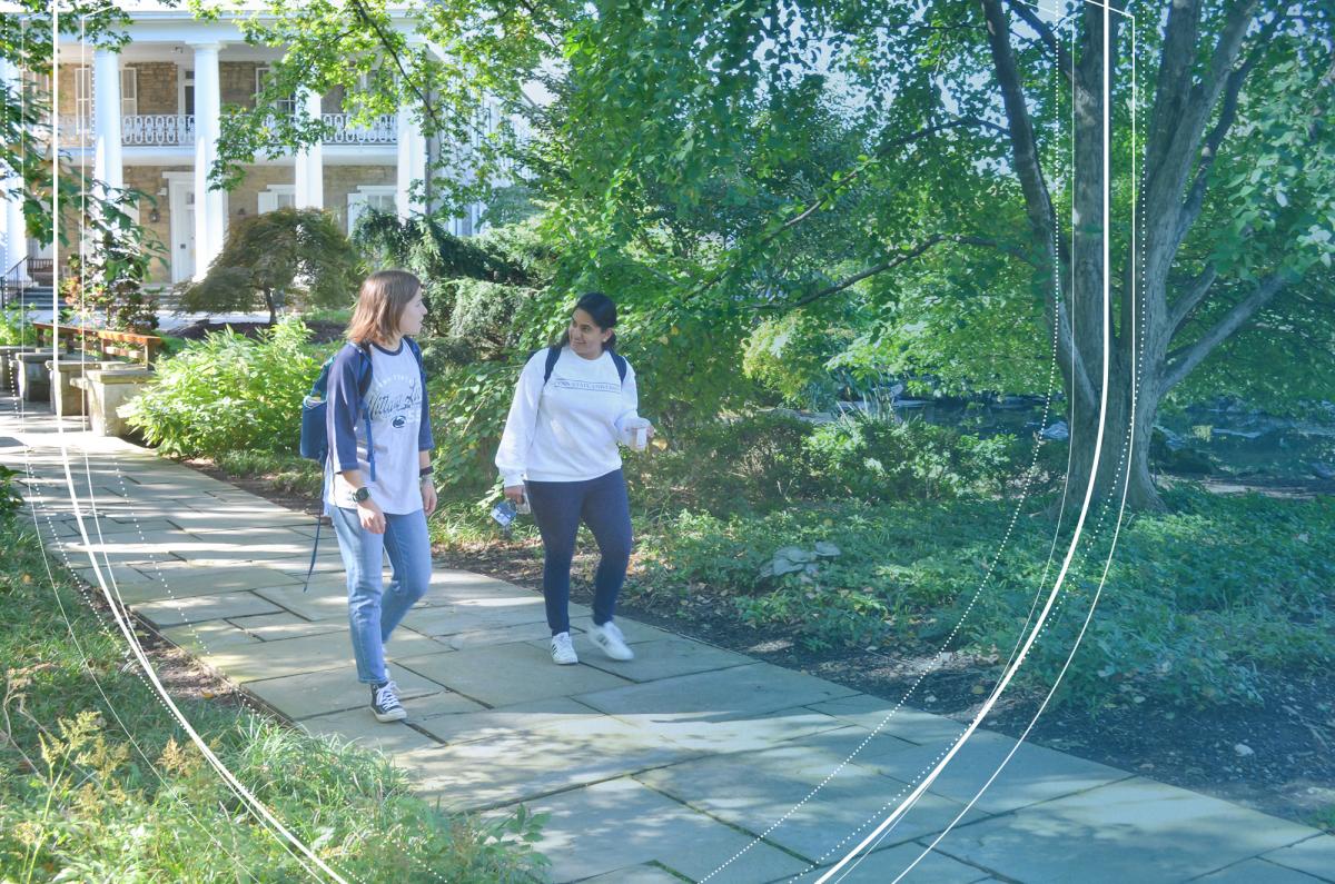 Undergraduate Students in conversation on campus.